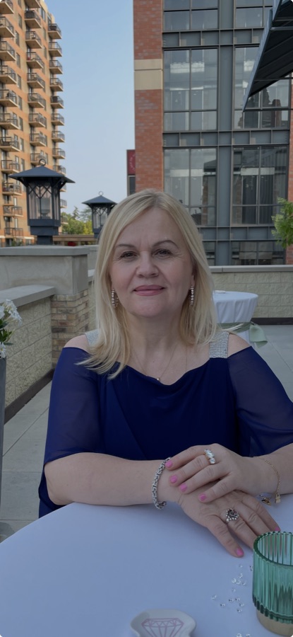 Adelina, owner of AZ Tailoring